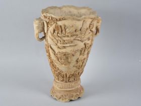 A Chinese Style Faux Ivory Vase decorated in Relief with Figures in Exterior Setting having Twin