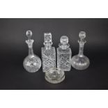 Four Cut Glass Decanters and Glass Bowl with Silver Plate Top