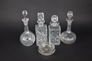 Four Cut Glass Decanters and Glass Bowl with Silver Plate Top