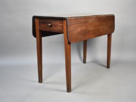 A Mahogany Drop Leaf Table on Square Tapering Supports, 95cms Wide