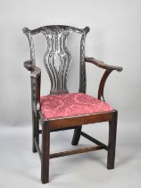 A Mahogany Framed Armchair with Carved and Pierced Back