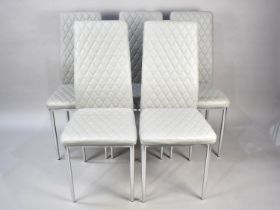 A Set of Five Modern Upholstered Chrome Based Dining Chairs