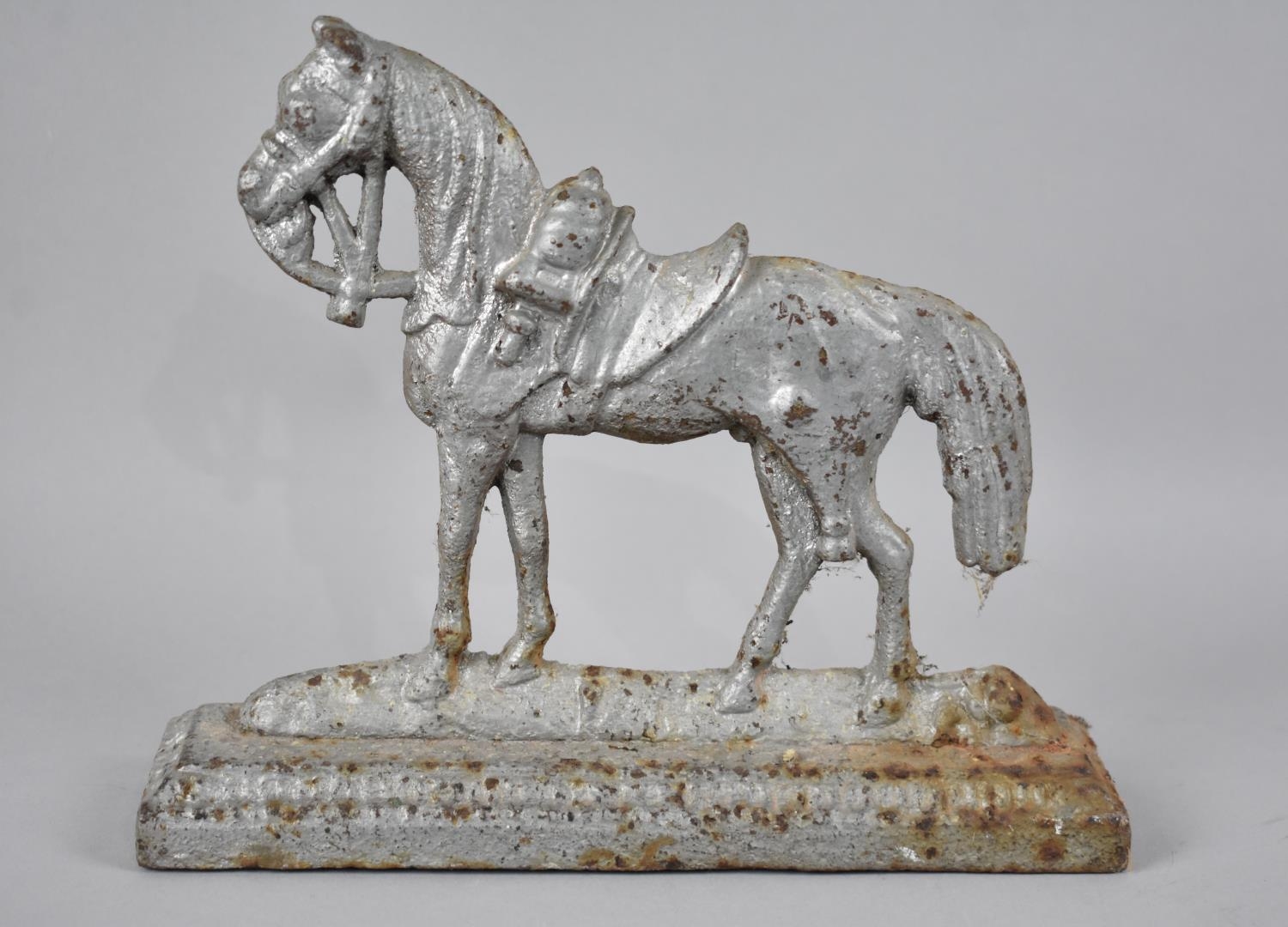 A 19th Century Cast Iron Doorstop or Fireside Ornament in the Form of a War Horse, Rectangular