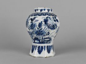An 18th Century Tin Glazed Blue and White Vase of Octagonal Baluster Form with Chinoiserie Bird