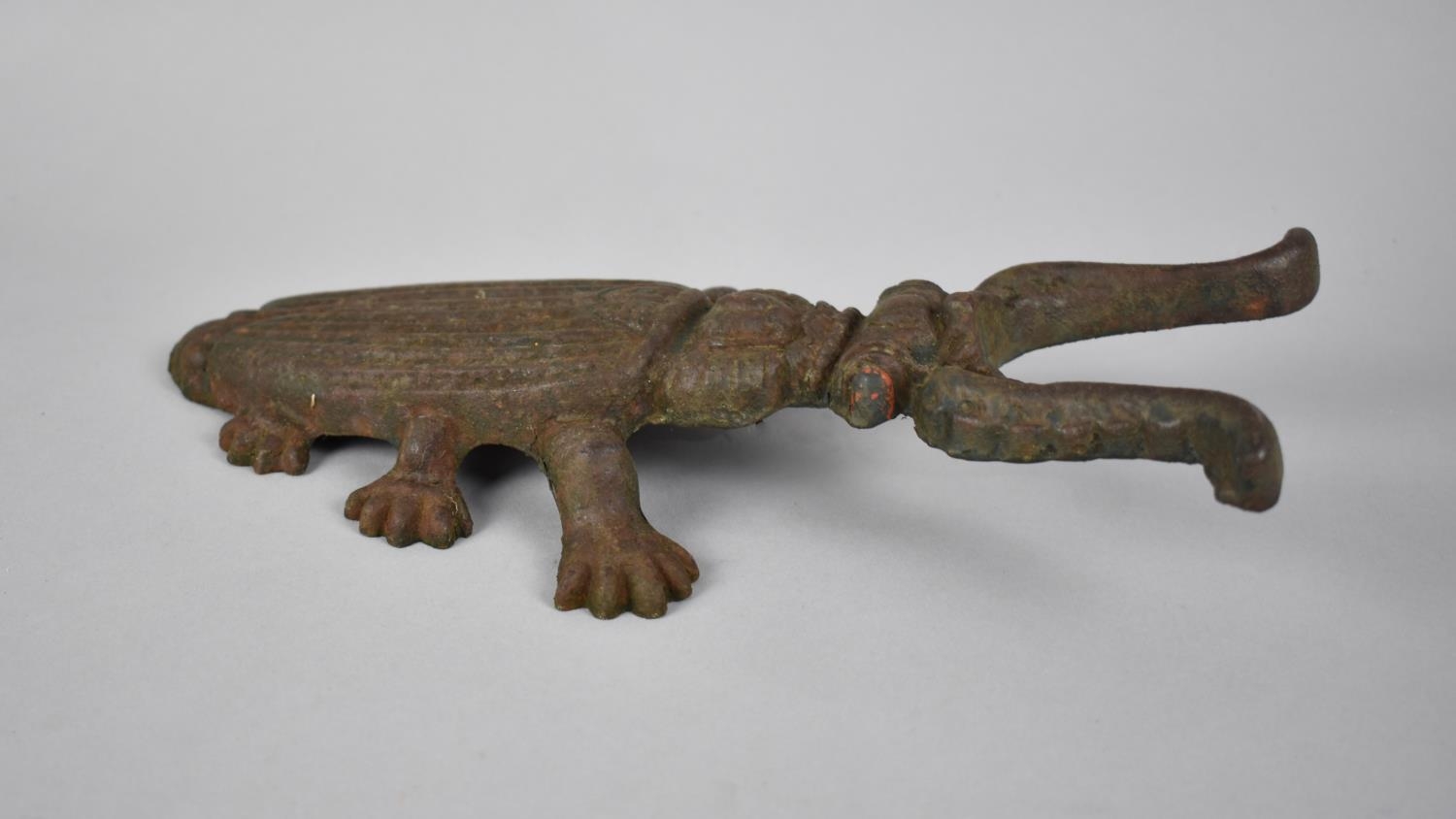 A Late 19th/Early 20th Century Cast Iron Boot Pull in the From of a Beetle, 29cms Long