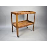 A Mahogany Two Tier Galleried Trolley, 72cms Wide and 72cms High