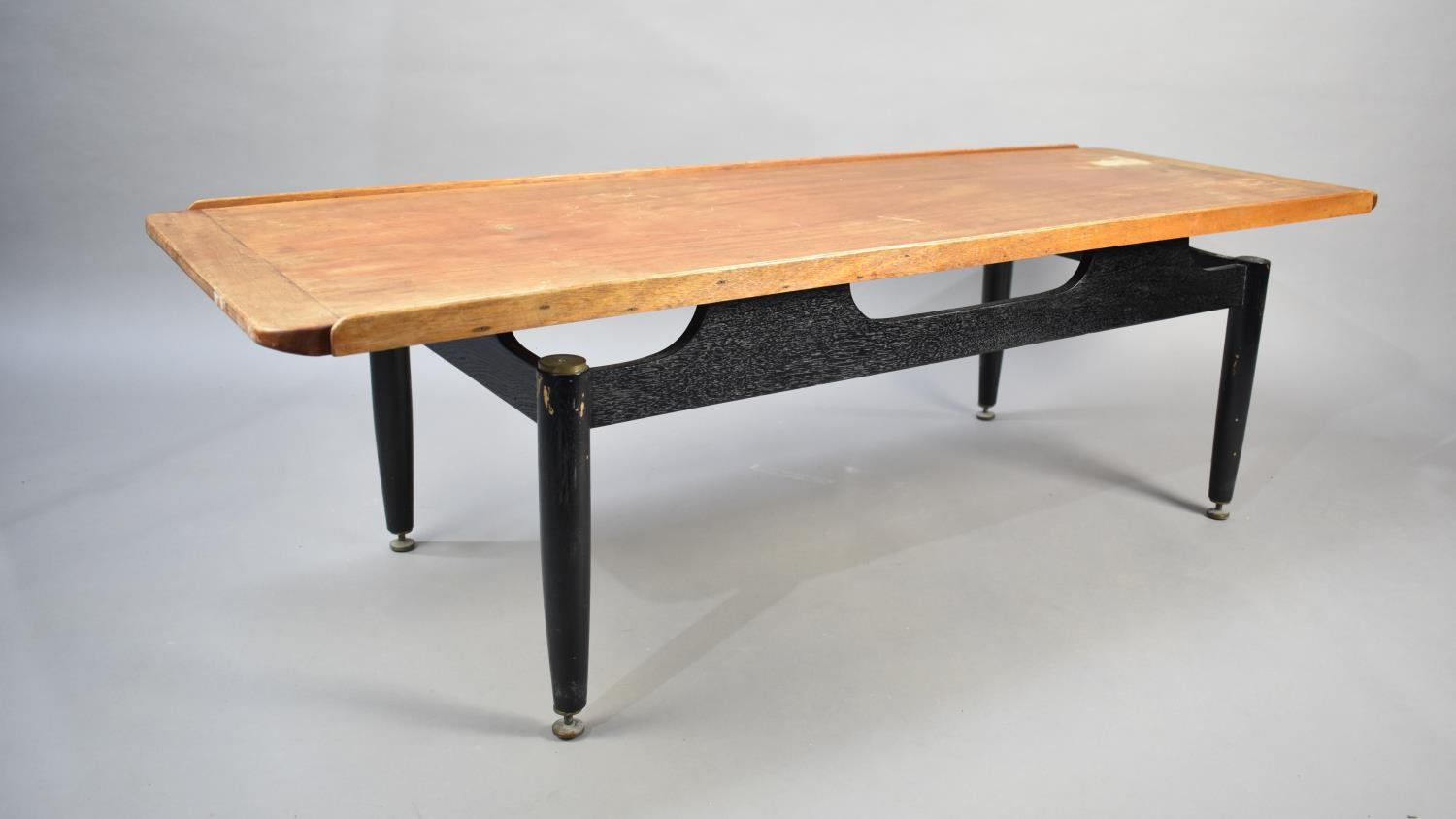 A 1970s Teak Topped Coffee Table, 137x50cms