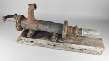 A Vintage Cast Metal Pump Mounted On Wooden Plank, 84cm Long