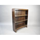 An Art Deco Oak Three Shelf Open Bookcase, 75cms Wide and 92cms High