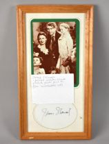 A Framed Wonderful Life Photo together with Card Signature by James Stewart