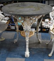 A White Painted Victorian Cast Iron Britannia Pub Table with Later Top Above a Foliate Frieze