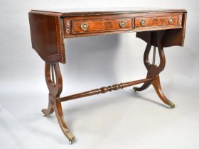 A Reproduction Mahogany Two Drawer Drop Leaf Sofa Table with Lyre Supports, 93cms Wide When Closed