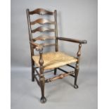 A Late 19th/Early 20th Century Rush Seated Ladder Back Armchair