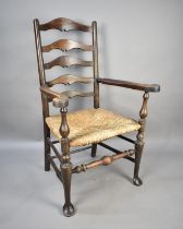 A Late 19th/Early 20th Century Rush Seated Ladder Back Armchair