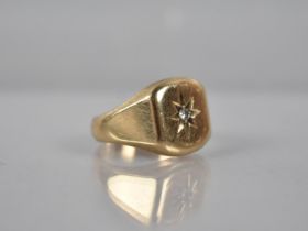 A 9ct Gold and Diamond Gents Signet Ring, Central Round Cut Diamond Measuring 2.1mm Diameter,