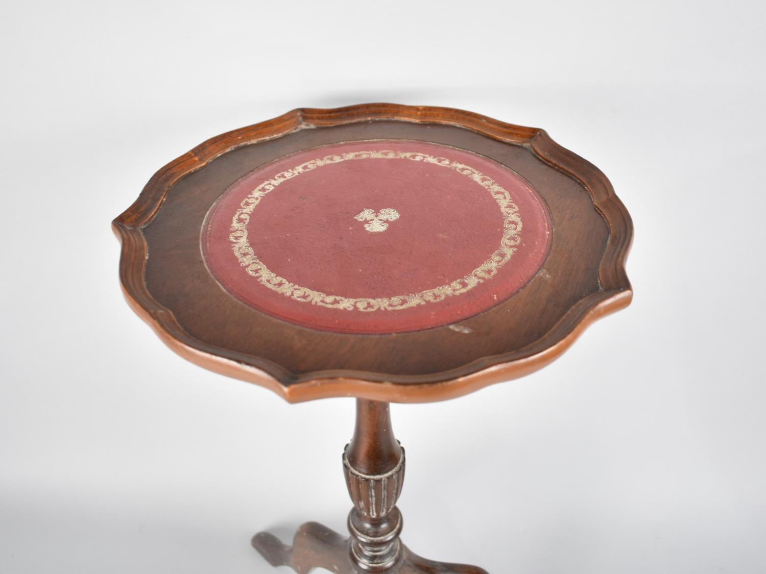 A Modern Mahogany Tripod Wine Table with Tooled Leather Insert, 29cms Diameter - Image 2 of 2