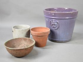 A Purple Glazed Terracotta Patio Planter, 38.5cms Diameter together with Various Smaller Examples