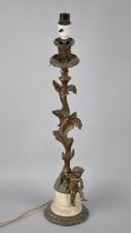 A Mid 20th Century Continental Gilt Brass Table Lamp with Cherub Mount, Condition issues, 63cms High