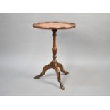 A Modern Circular Tripod Wine Table with Inset Tooled Leather Panel, 36cms Diameter