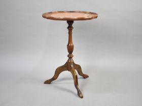 A Modern Circular Tripod Wine Table with Inset Tooled Leather Panel, 36cms Diameter