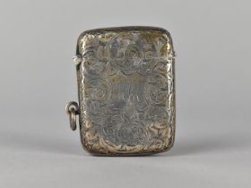 A Silver Vesta Case with Floral Scroll Engraved Decoration, 5cm high