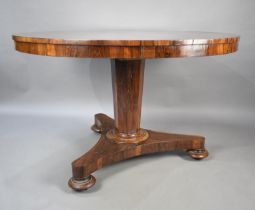 A Victorian Circular Rosewood Snap Top Loo Table on Triform Base, 119cms Diameter