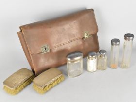 A Goldsmiths and Silversmiths Company Leather Gents Travelling Vanity Case Containing Silver Mounted