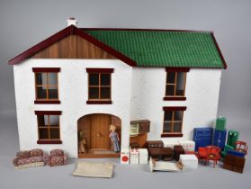 A Late 20th Century Dolls House with Small Collection of Furniture, 76cms Wide and 48cms High