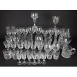A Large Collection of Various Drinking Glasses to Comprise Champagne Flutes, Wines, Tumblers etc