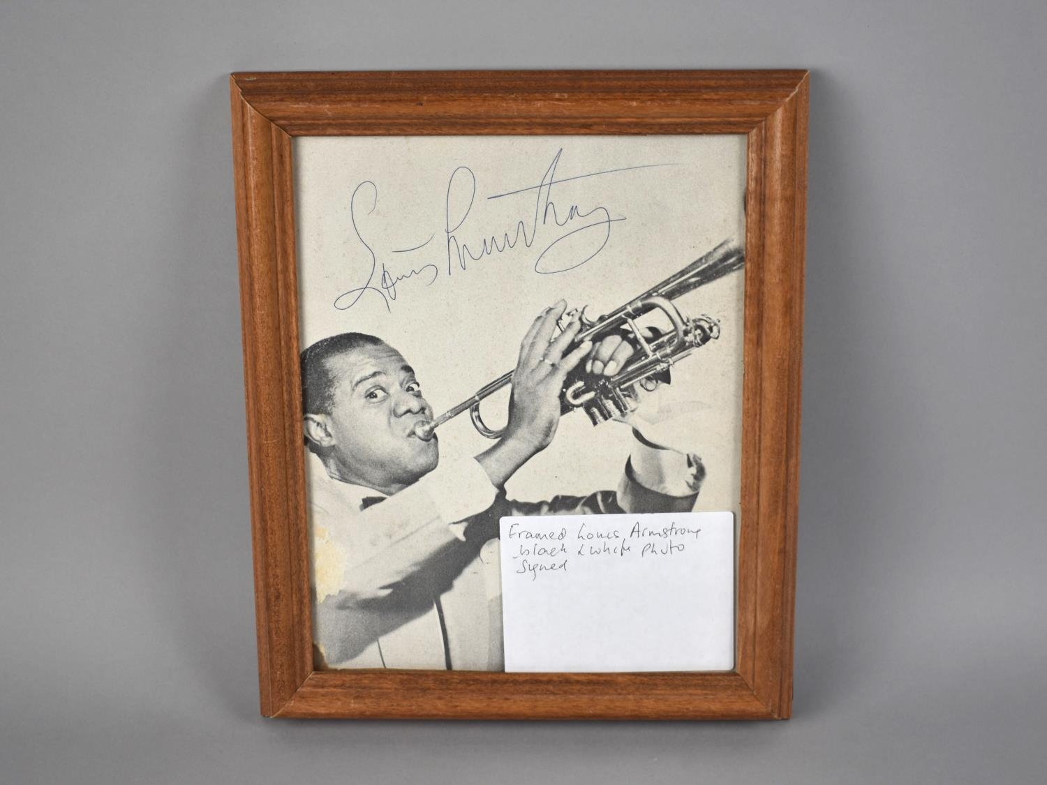A Framed Louis Armstrong Black and White Signed Photograph