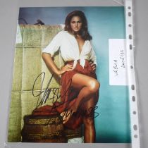 A Framed and Autographed Coloured Photo of Ursula Andress with Certificate of Authenticity