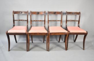 A Set of Four Bar Back Dining Chairs