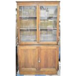 An Edwardian Oak Glazed Bookcase with Cupboard Base, 106cms Wide