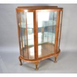 A Mid 20th Century Bow Fronted Display Cabinet with two Glass Shelves and Galleried Back, 91cms Wide