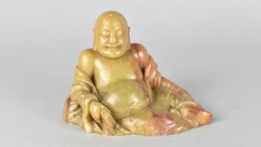 A Carved Chinese Soapstone Figure of Reclining Buddha, 13cms Wide and 9cms High