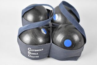 A Cotswold Bowls Centre Canvas Carrier Containing Two Pairs of Lawn Bowls