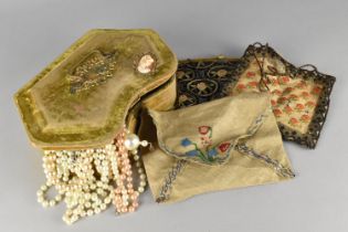 A Late Victorian/Edwardian Velvet Jewellery Box Containing Various Pearl and Faux Pearl Necklaces,
