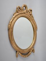 A Mid 20th Century Gilt Framed Oval Wall Mirror, 49cms High
