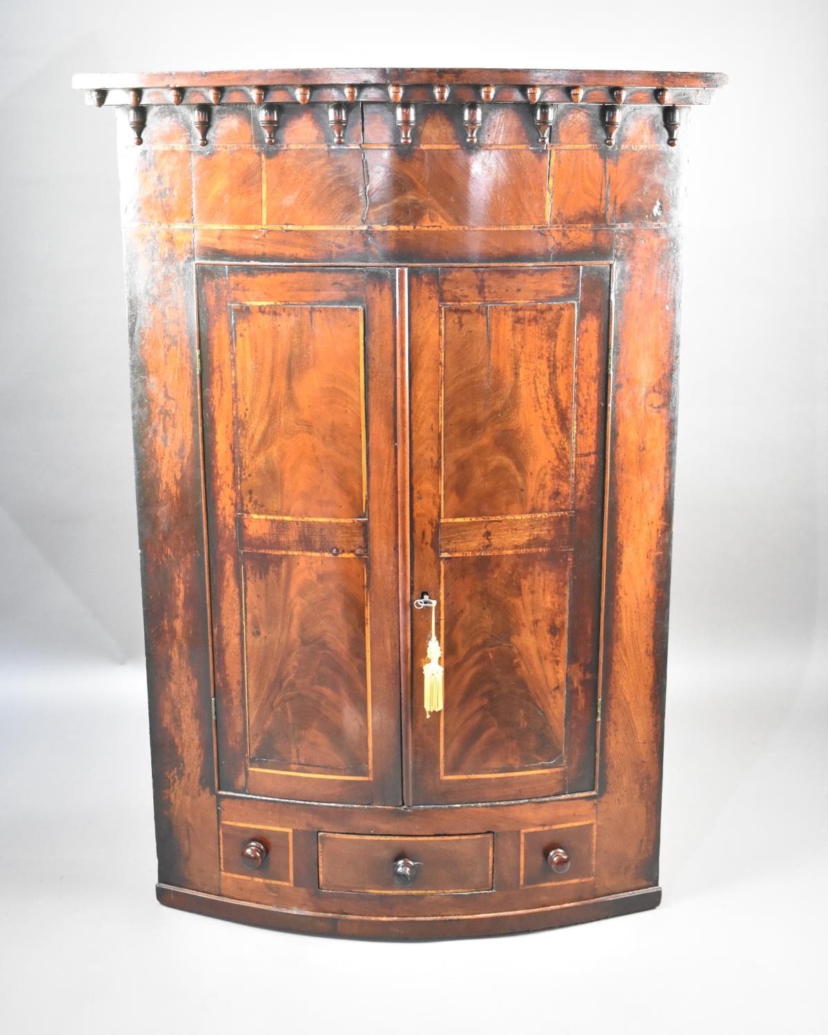 A Mid 19th Century Inlaid Mahogany Bow Fronted Wall Hanging Corner Cabinet with Panelled Doors and