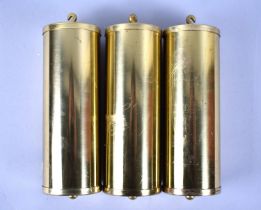 A Set of Three Brass Covered Cylindrical Clock Weights, 14cms High