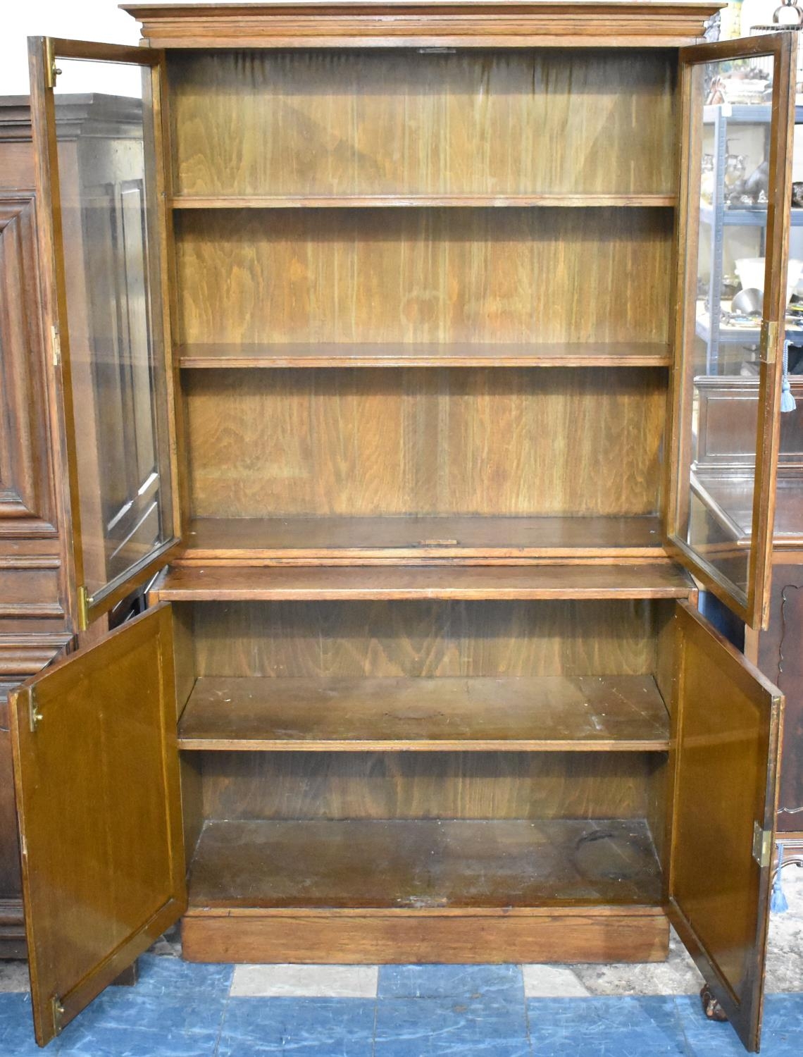 An Edwardian Oak Glazed Bookcase with Cupboard Base, 106cms Wide - Image 2 of 2
