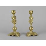 A Pair of Brass Lincoln Imp Candlesticks, 17cms High