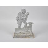 A 19th Century Fret Cut Cast Iron Doorstop in the From of a Minstrel, 26cms High