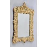 A Mid 20th Century Gilt Framed Wall Mirror, 46cms by 62cms