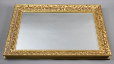 A Modern Rectangular Gilt Framed Wall Mirror, 90x63cms