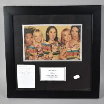 A Framed Colour Photograph of The Spice Girls Signed by All Five Members