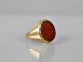A 9ct Gold Signet Ring, Mounted with Oval Cut Carnelian Panel, Size I.5, London Hallmark and