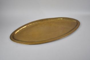 An Edwardian Oval Brass Tray of Narrow Proportion, 64cms Long
