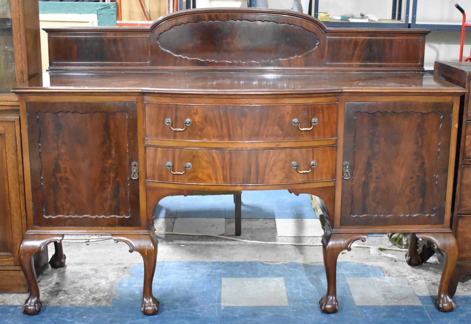 An Edwardian Mahogany Galleried Sideboard with Bowed Breakfront Having Cutlery Drawer and One Drawer
