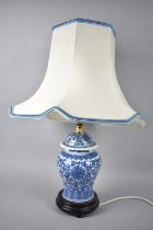 A Modern Oriental Blue and White Vase Shaped Table Lamp with Shade, 52cms High Overall